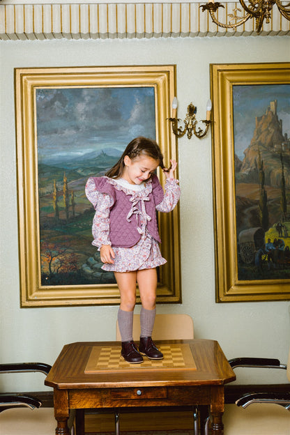 Vaikiška liemenė su gėlėtu pamušalu